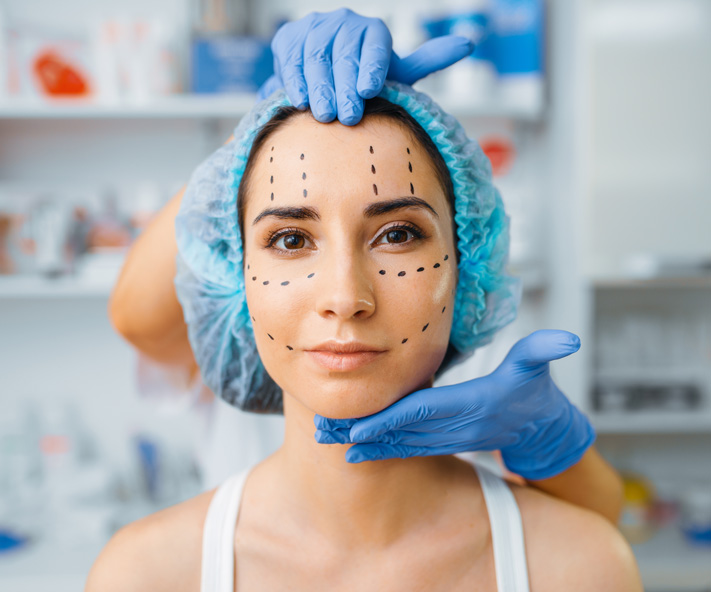 Woman receiving Facial Sculpting and Body Acupuncture treatment for natural facial rejuvenation and holistic beauty enhancement